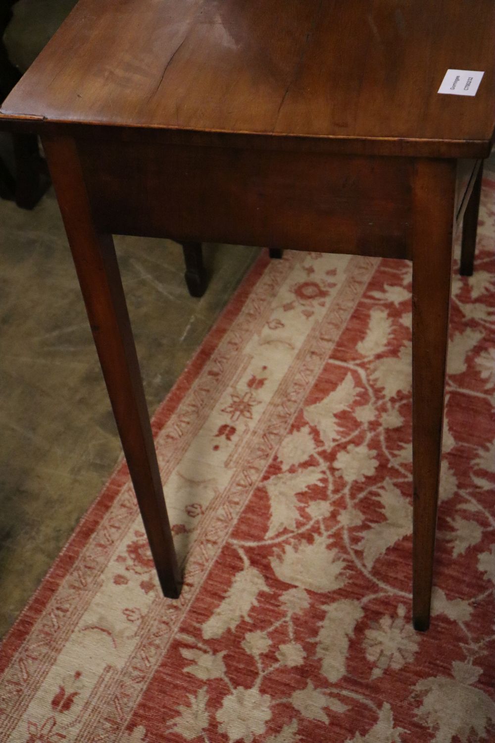 A Georgian inlaid mahogany bow front two drawer side table, width 82cm, depth 45cm, height 78cm